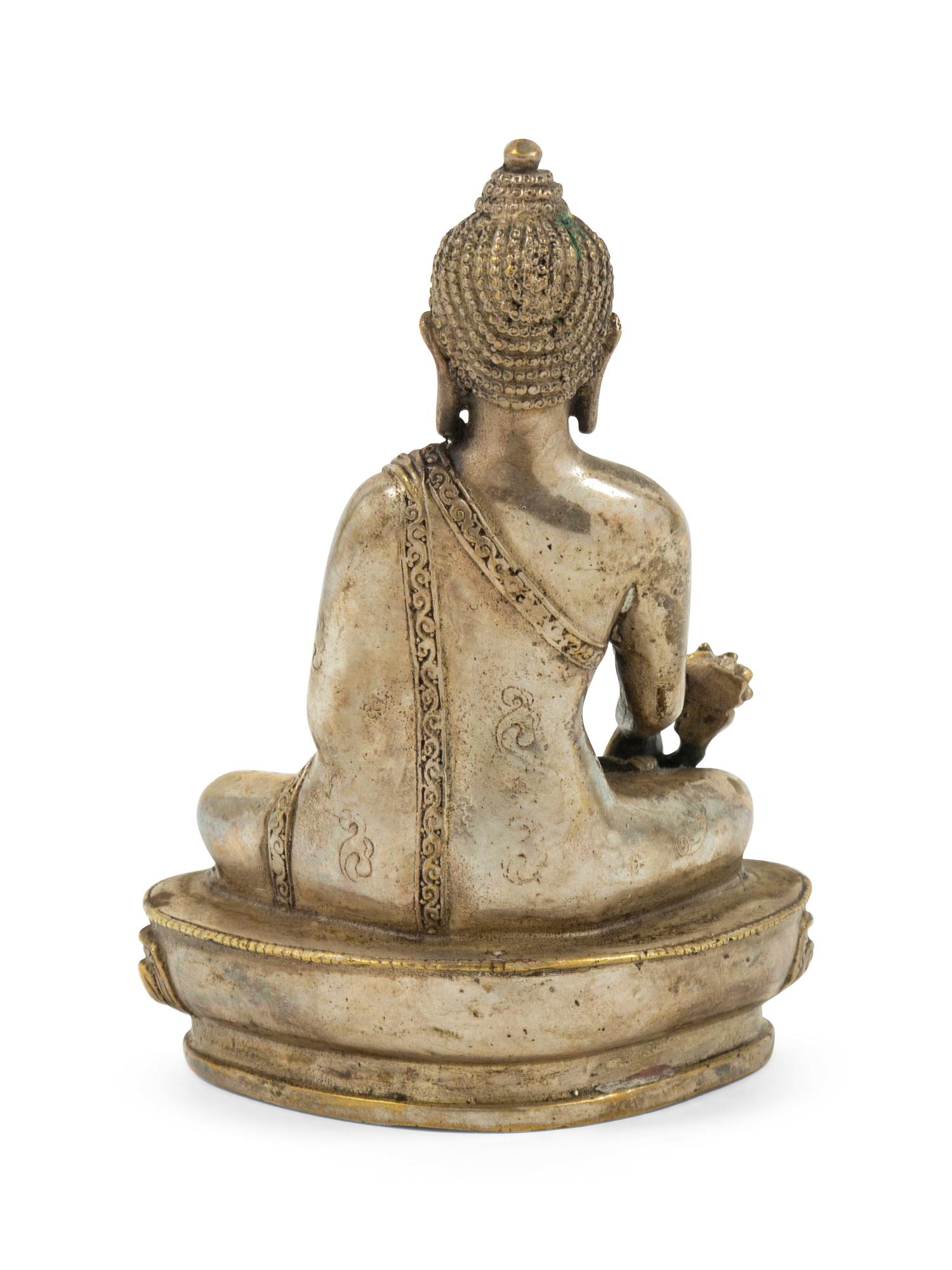 A Sino-Tibetan Bronze Figure of Seated Buddha