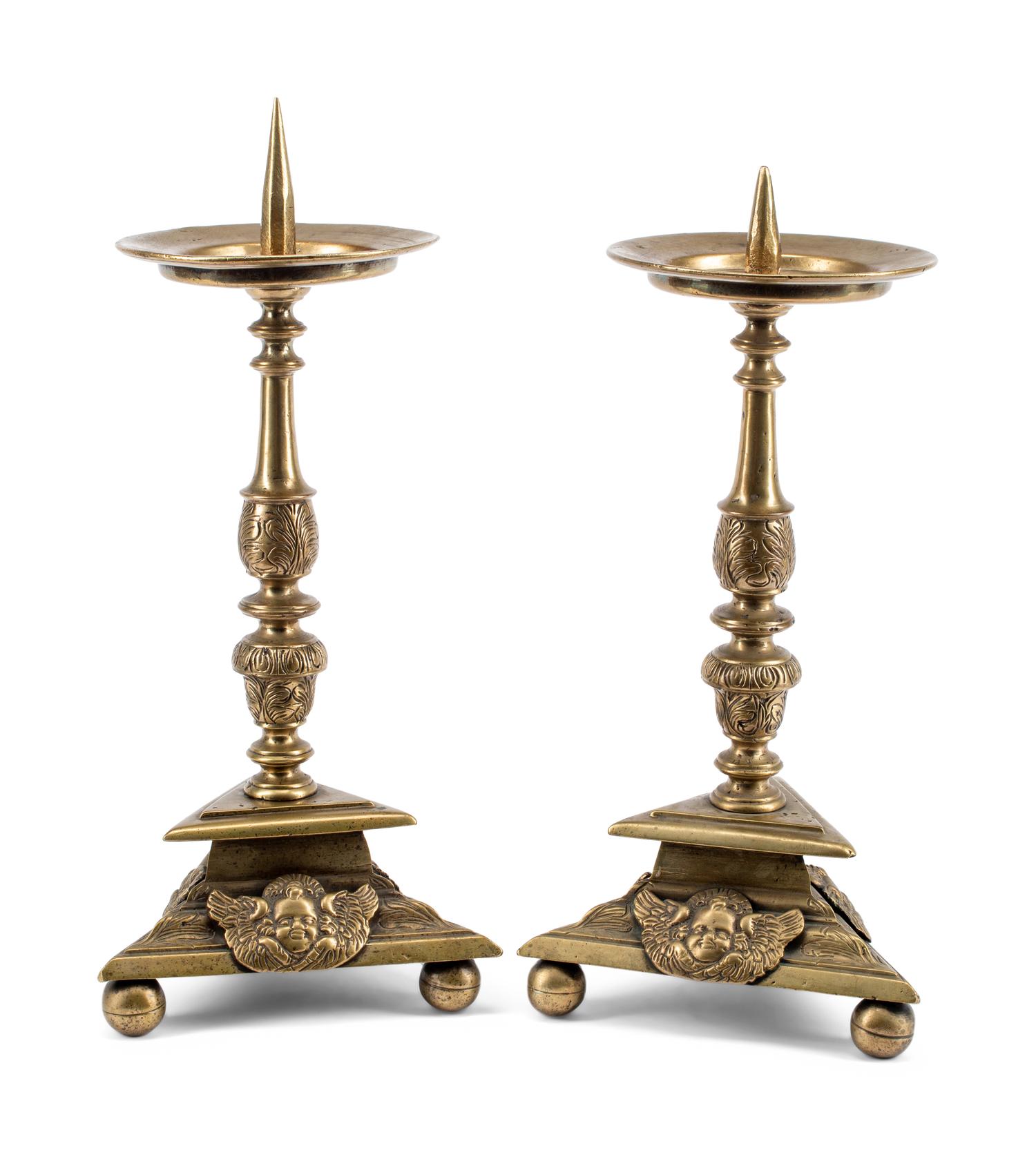 A Pair of Continental Brass Prickets