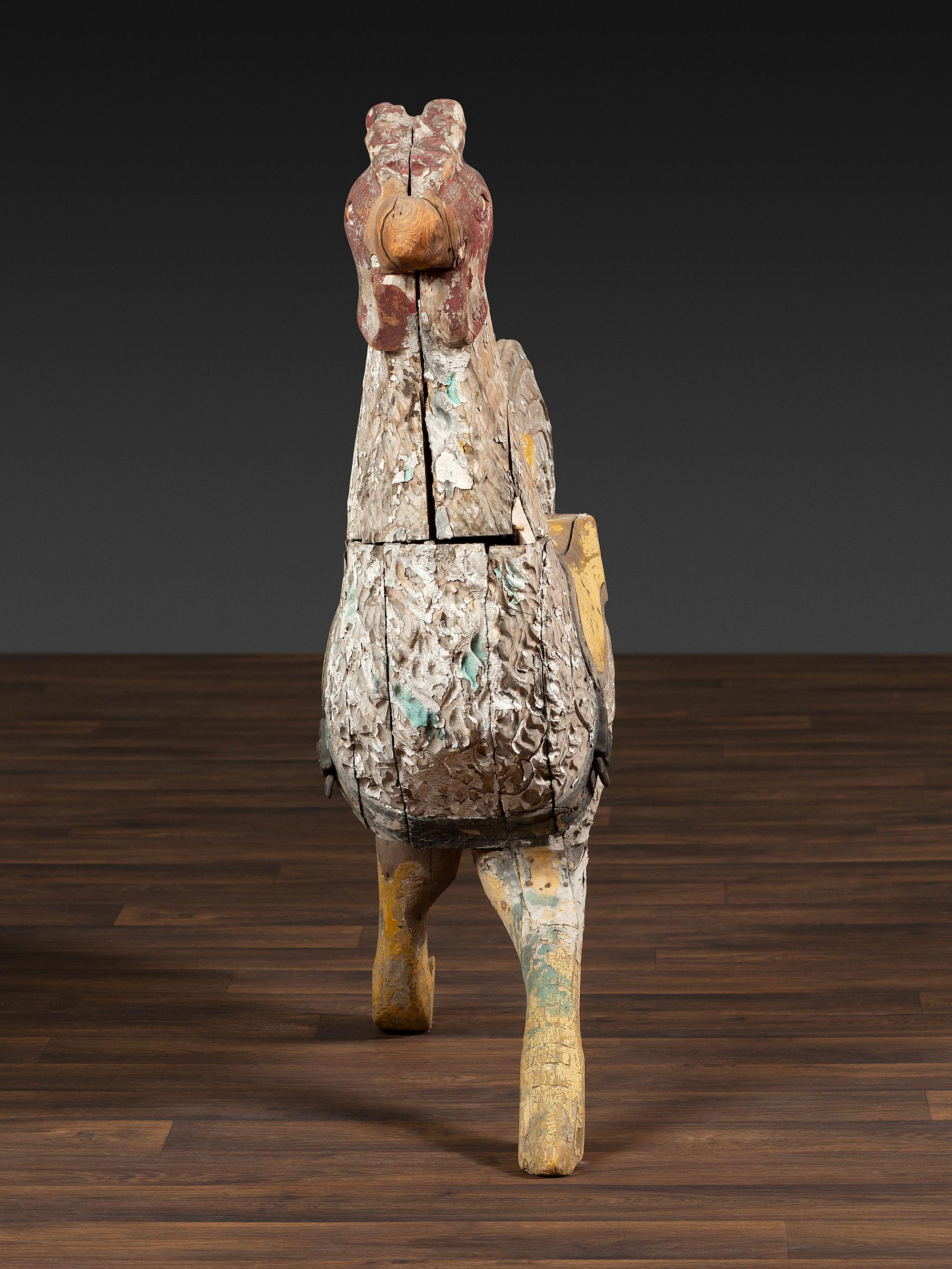 A Carved and Painted Wood Rooster Carousel Figure
