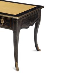 A Louis XIV Brass-Inlaid and Gilt Bronze Mounted Ebony Bureau Plat