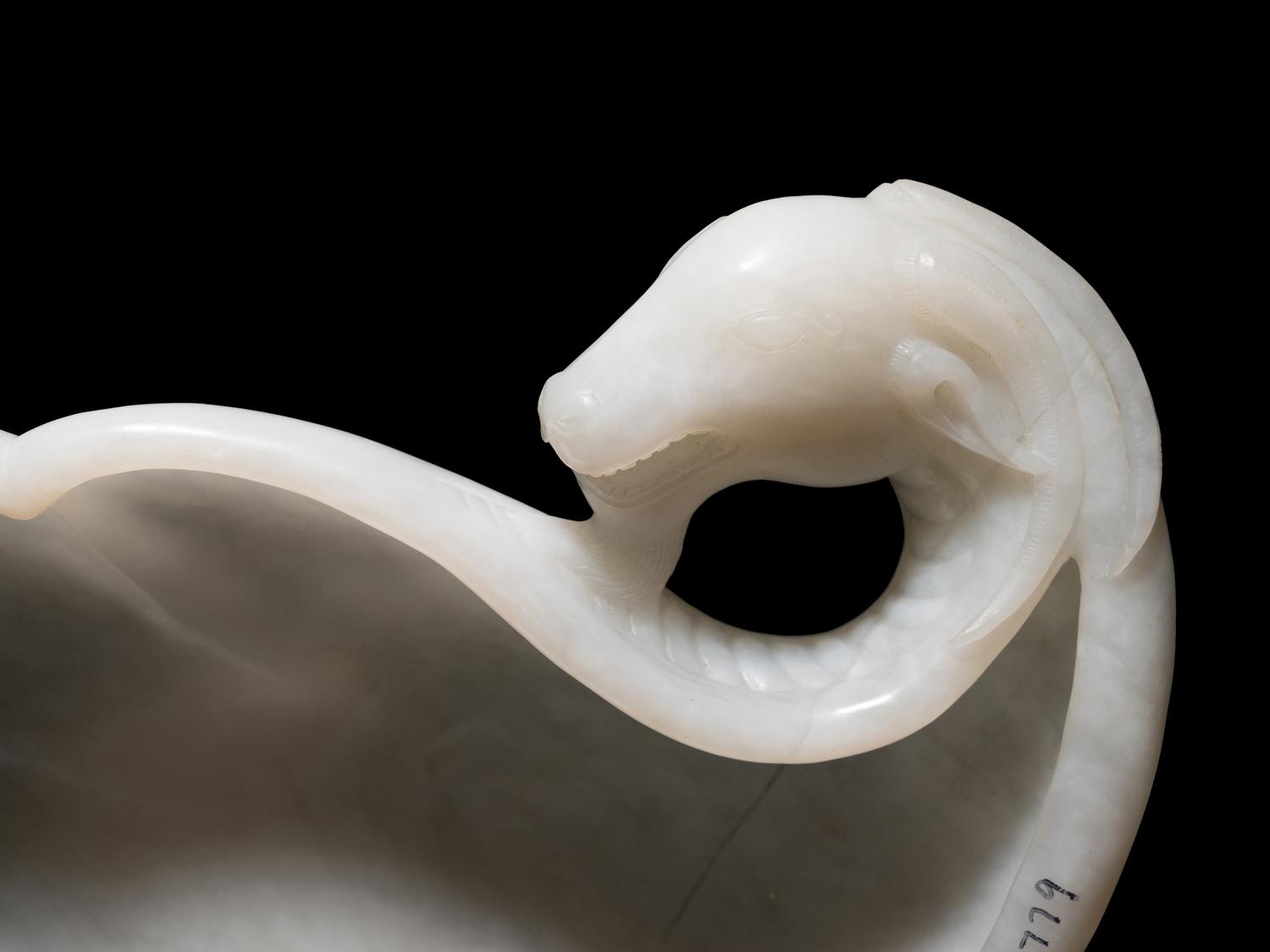 A Chinese White Jade 'Ram's Head' Dish