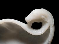 A Chinese White Jade 'Ram's Head' Dish