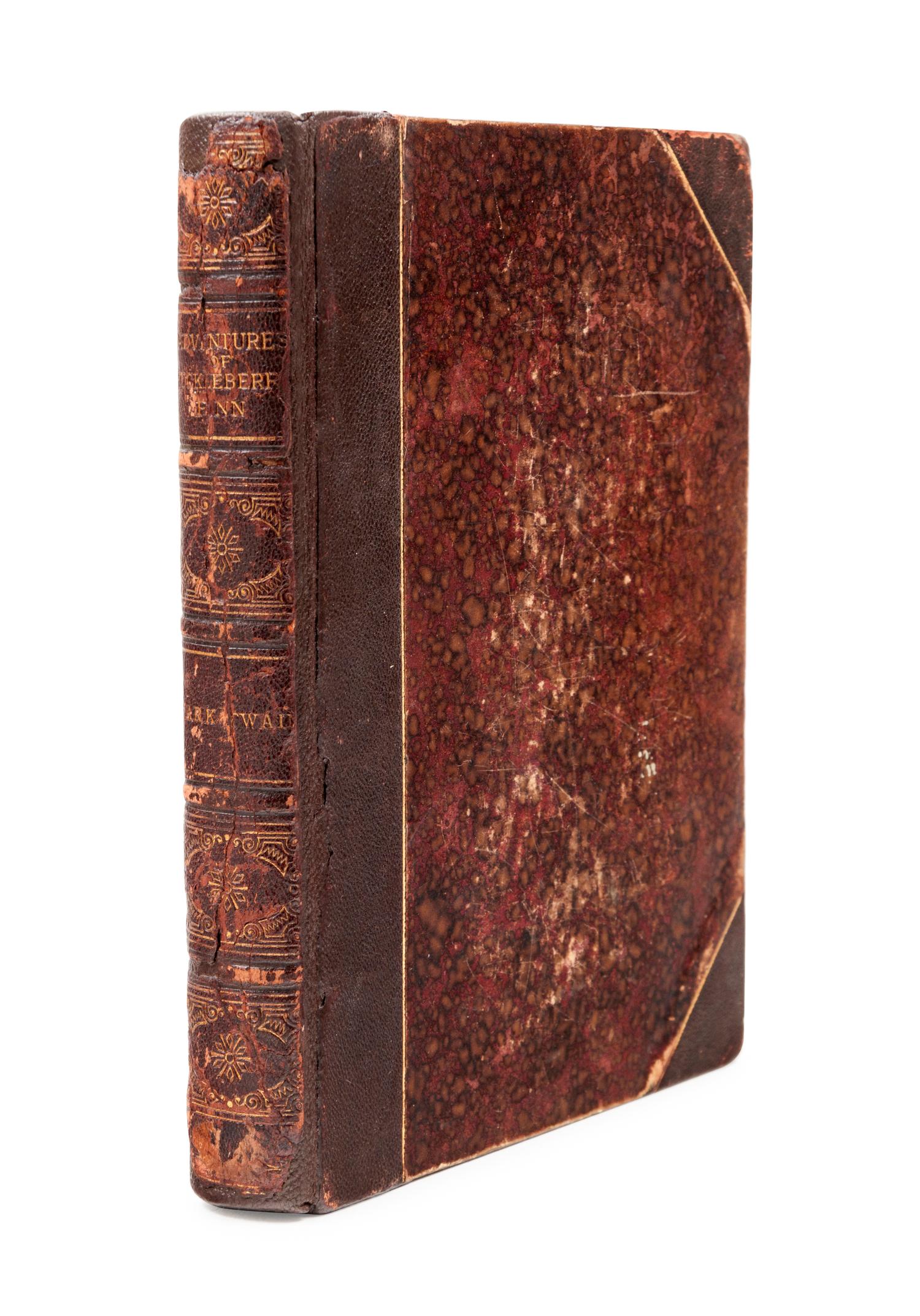 CLEMENS, Samuel Langhorne ("Mark Twain") (1835-1910). Adventures of Huckleberry Finn (Tom Sawyer's Comrade) . New York: Charles L. Webster and Company, 1885.