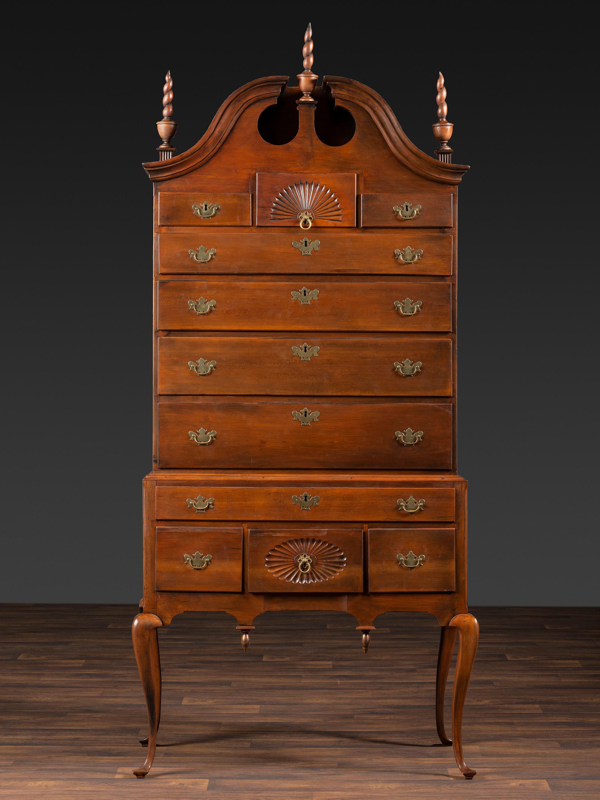 A Queen Anne Fan-Carved Cherrywood Bonnet Top High Chest
