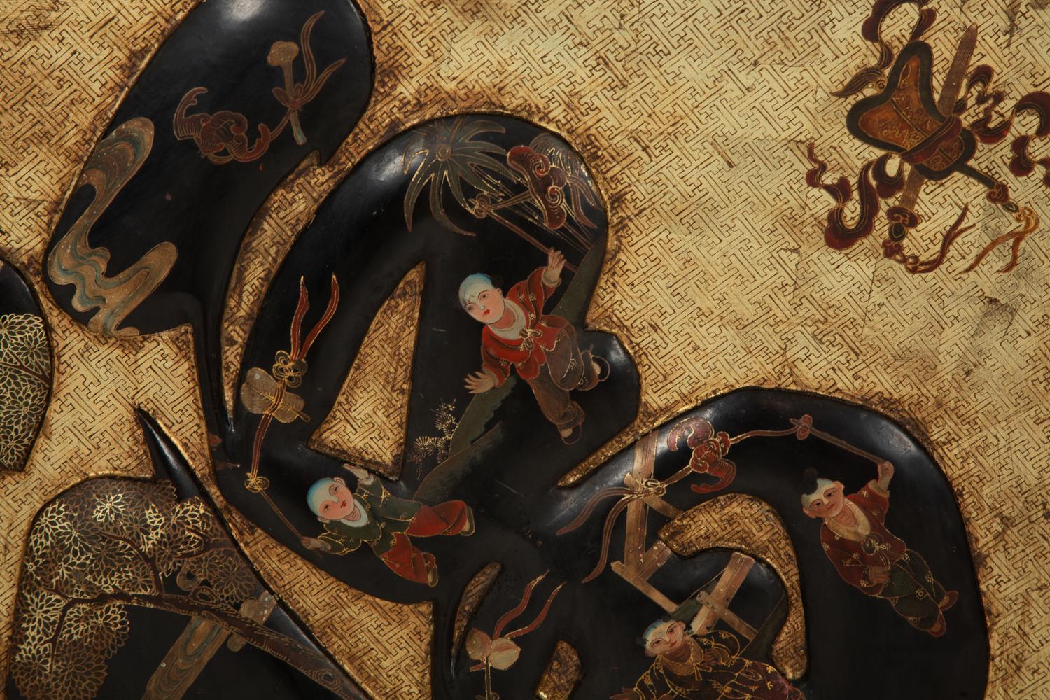 A Pair of Chinese Gilt and Lacquered Wall Hangings