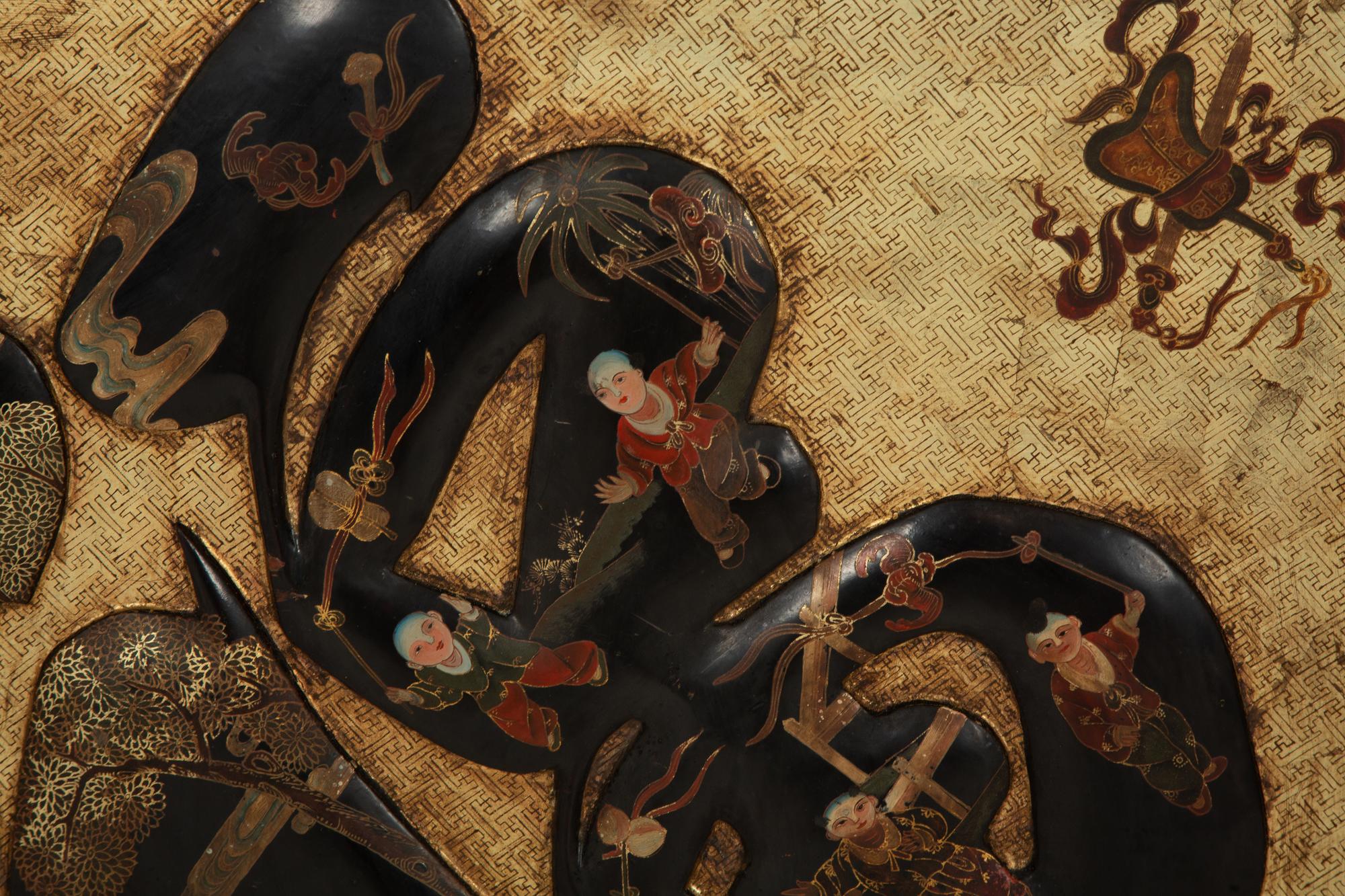 A Pair of Chinese Gilt and Lacquered Wall Hangings