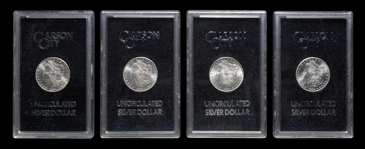 A Group of Eight 1884-CC GSA: Morgan $1 Coins