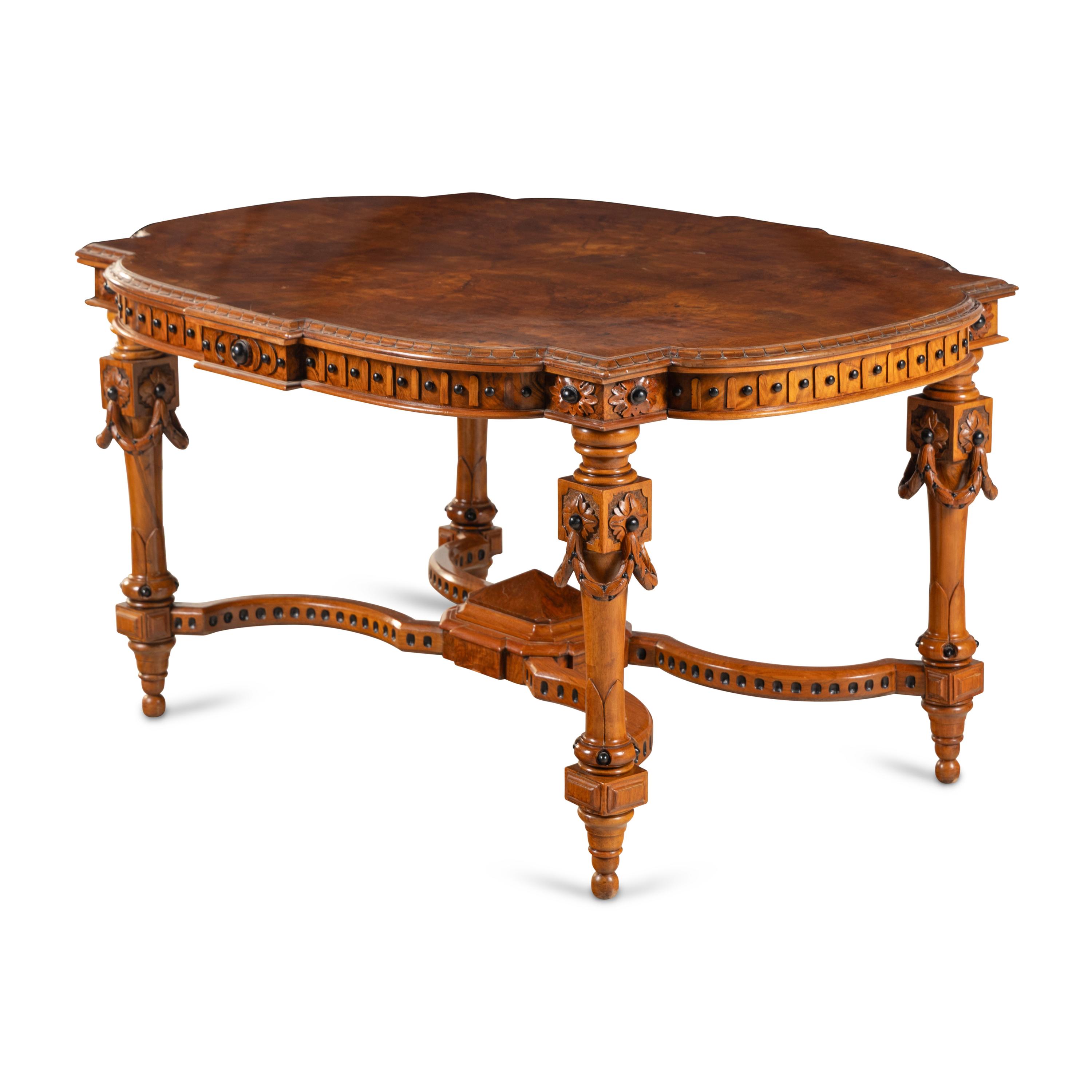 An English Walnut and Part Ebonized Center Table