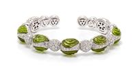 An 18 Karat White Gold, Peridot and Diamond Semi-Flexible Cuff Bracelet, Verdi, 28.60 dwts.