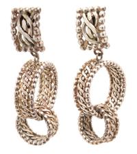 A Pair of Dominique Aurientis Silvertone Earclips, 3" x .75".
