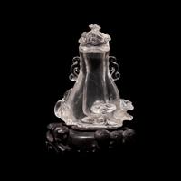 A Small Chinese Rock Crystal Vase and Cover with Wood Stand, Qing Dynasty 清 水晶靈芝紋小蓋瓶