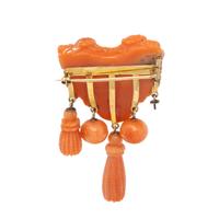 ANTIQUE, CARVED CORAL AND YELLOW GOLD BROOCH