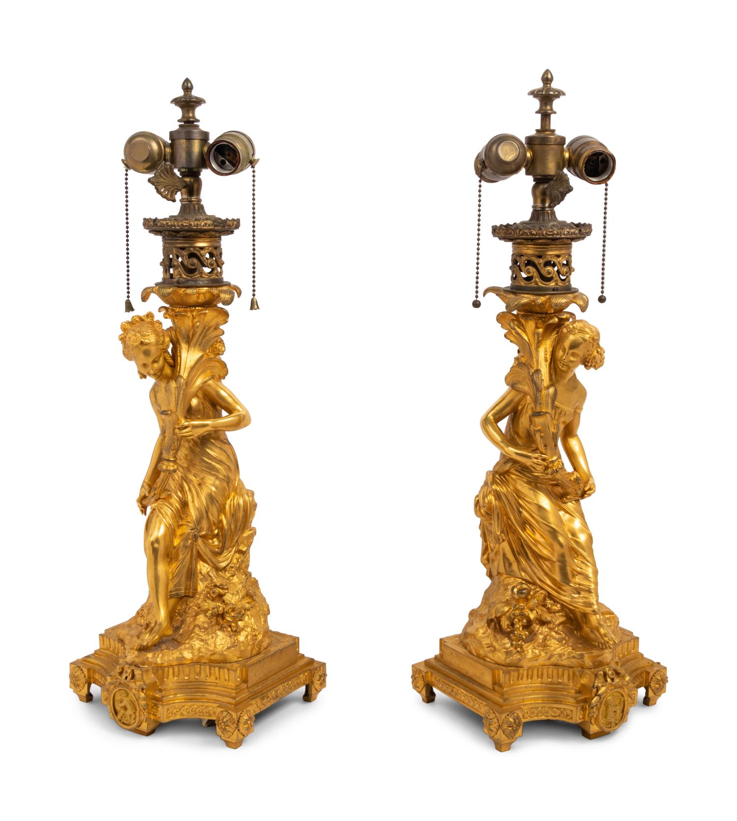 A Pair of French Gilt Bronze Figural Fluid Lamps Converted to Electricity
