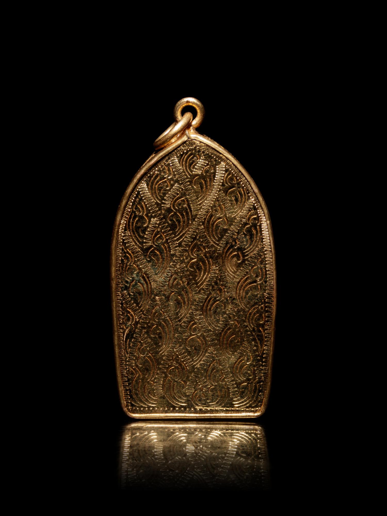 A Small Thai Gold Mounted Terracotta Buddhist Votive