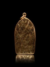 A Small Thai Gold Mounted Terracotta Buddhist Votive