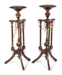 A Pair of Victorian Part-Ebonized and Gilt Walnut Plant Stands