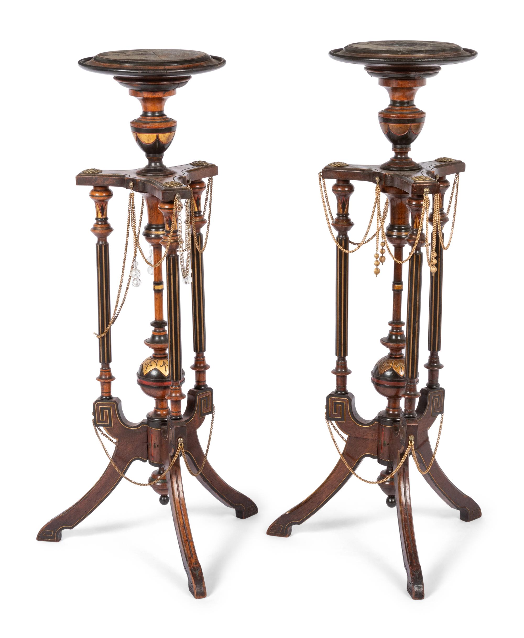 A Pair of Victorian Part-Ebonized and Gilt Walnut Plant Stands