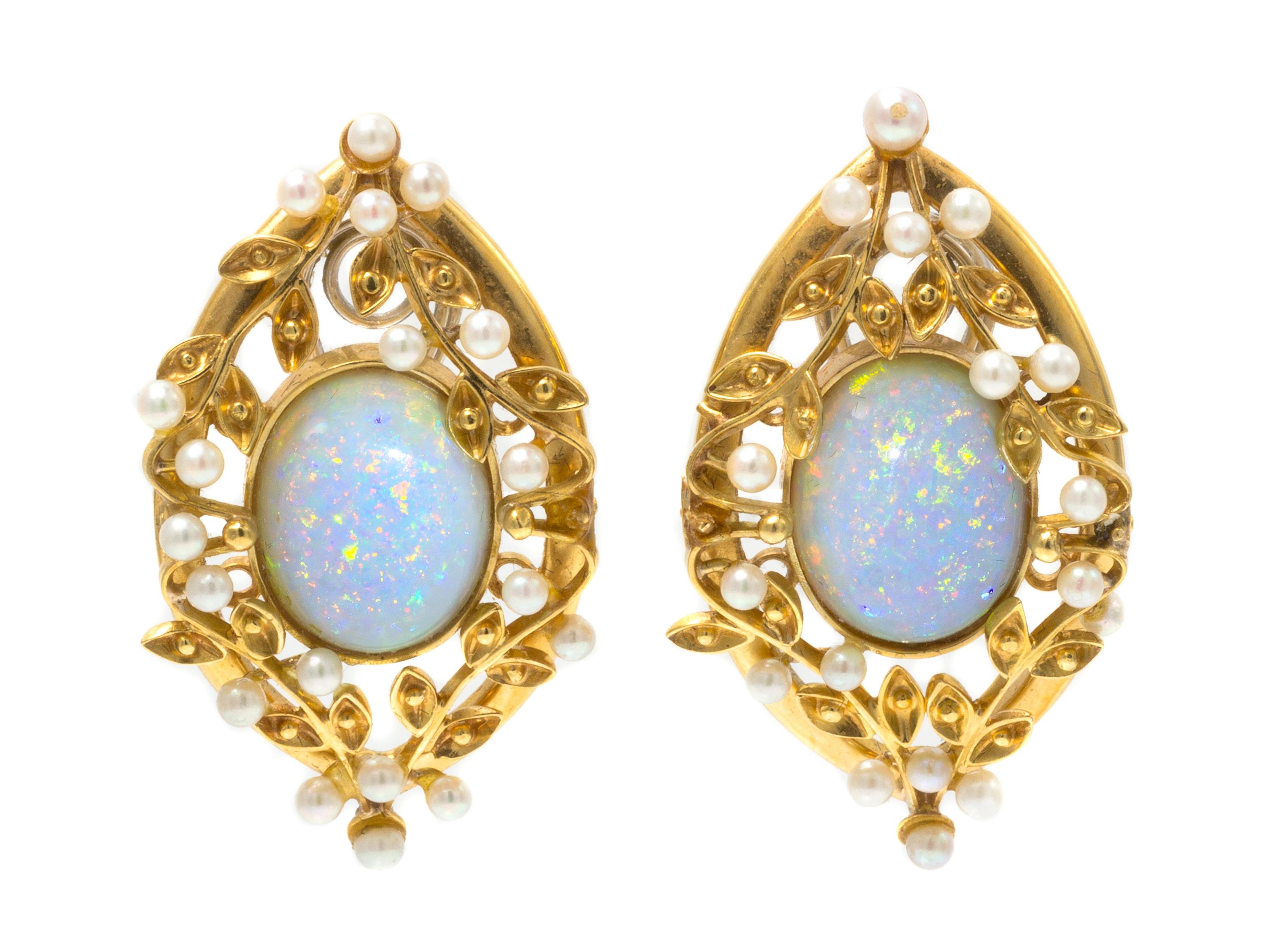 A Pair of 18 Karat Yellow Gold, Opal and Seed Pearl Foliate Motif Earclips, 14.80 dwts.