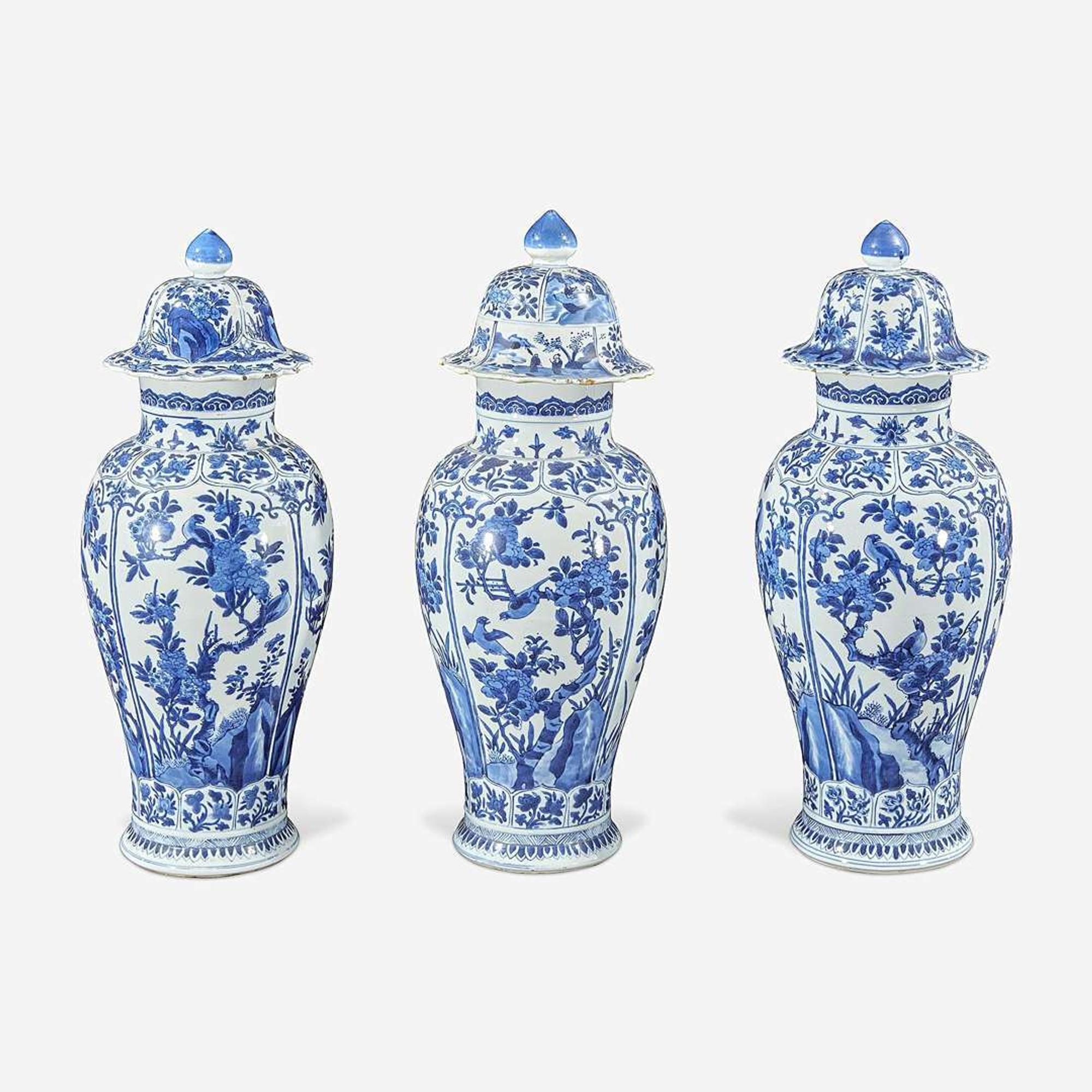 Three Chinese blue and white porcelain baluster vases and covers Kangxi period
