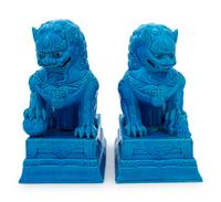 A Pair of Chinese Turquoise Glazed Porcelain Figures of Fu Lions