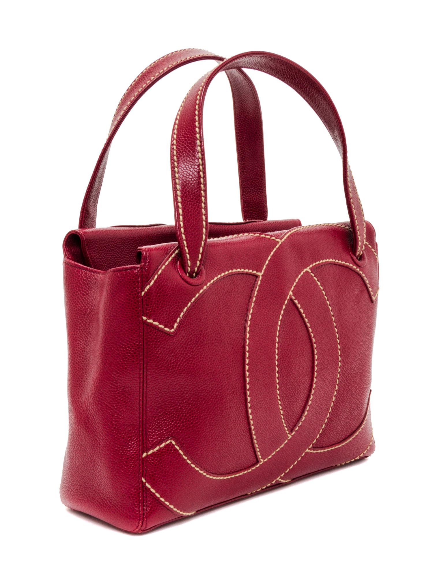 A Chanel Dark Red Caviar Leather Handbag, 11" x 8" x 3.75".