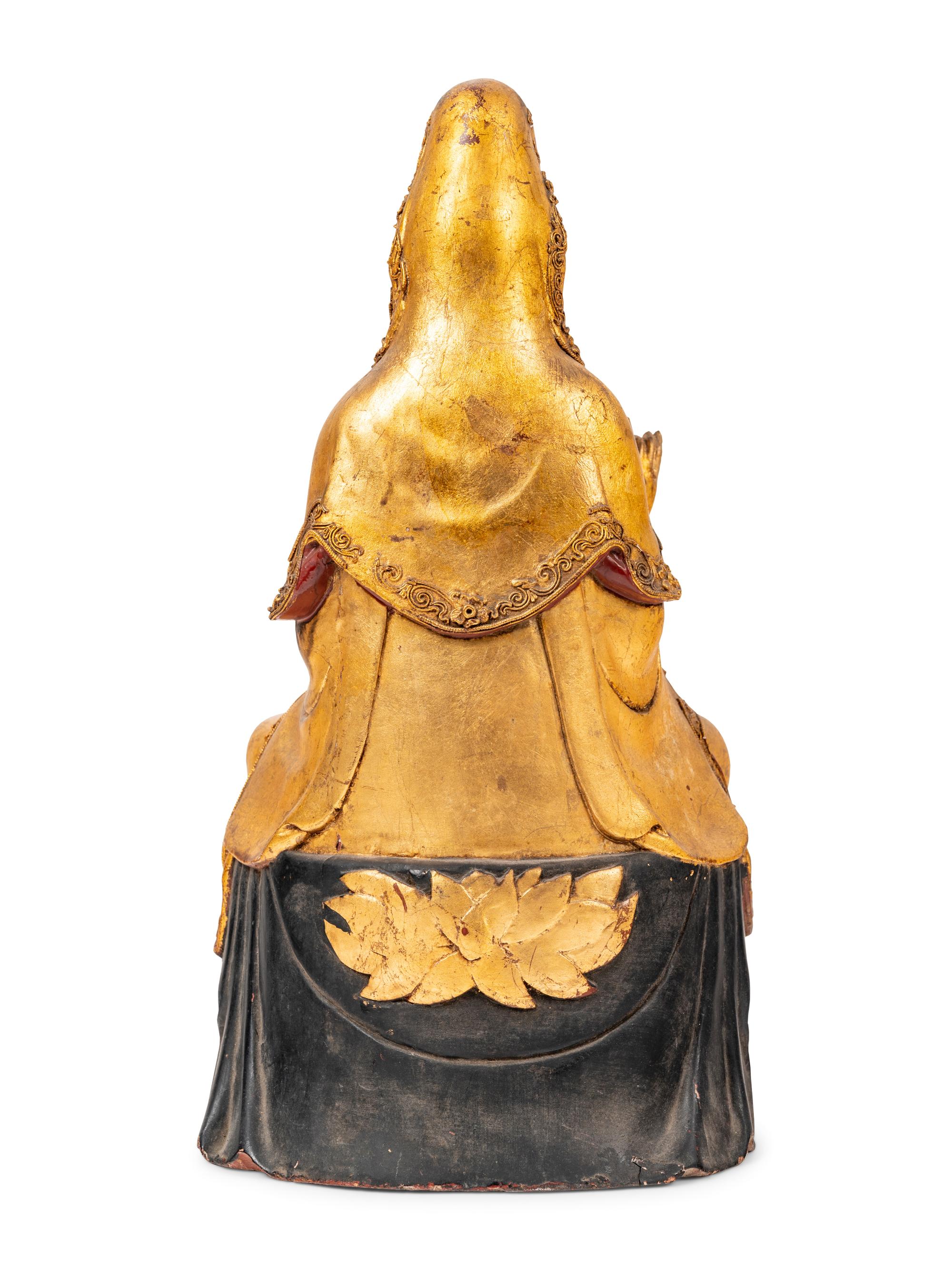 A Chinese Gilt Lacquered Wood Figure of Guanyin