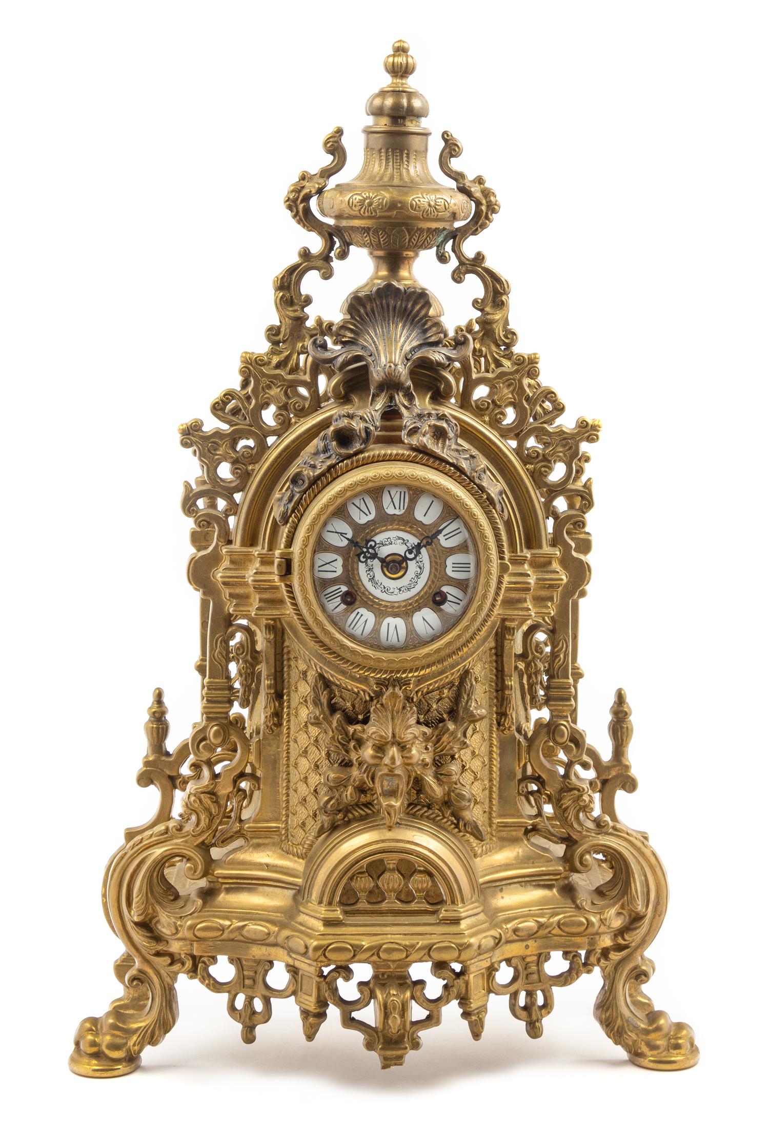 A Continental Neoclassical Brass Mantel Clock