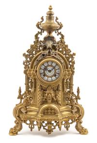 A Continental Neoclassical Brass Mantel Clock