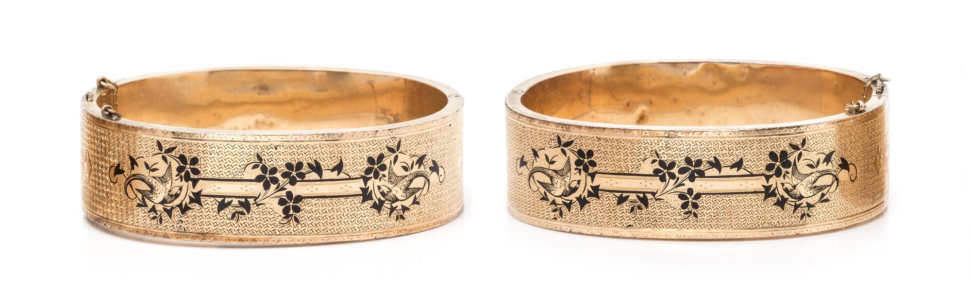 A Pair of Victorian Yellow Gold and Enamel Bangle Bracelets, 43.35 dwts.