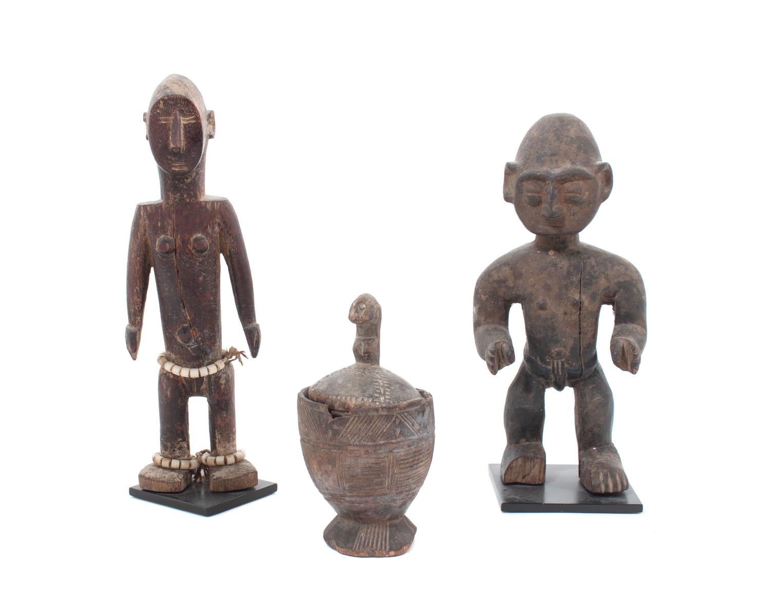 Two Carved Wood African Figures Height of tallest 12 inches.