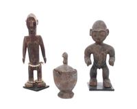 Two Carved Wood African Figures Height of tallest 12 inches.