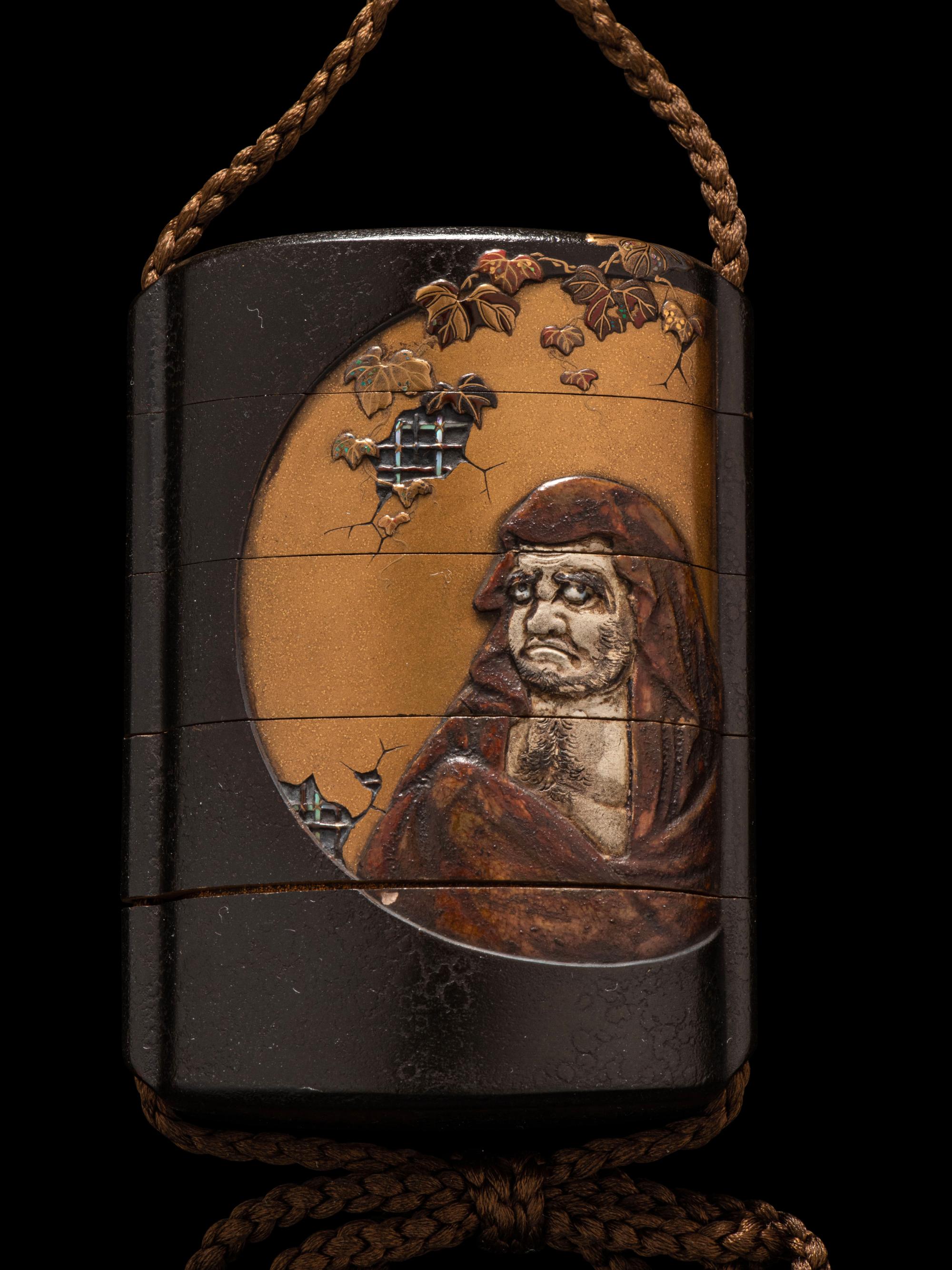A Japanese Gold and Black Lacquer Four-Case Inro