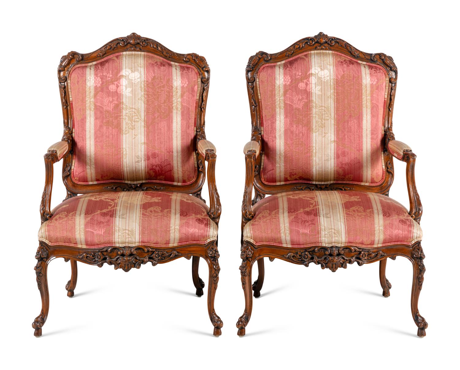 A Pair of Louis XV Style Walnut Fauteuils