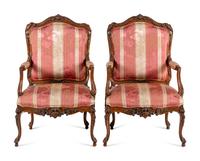 A Pair of Louis XV Style Walnut Fauteuils