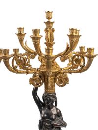 A Large French Gilt and Patinated Bronze and Rouge Marble Three-Piece Clock Garniture