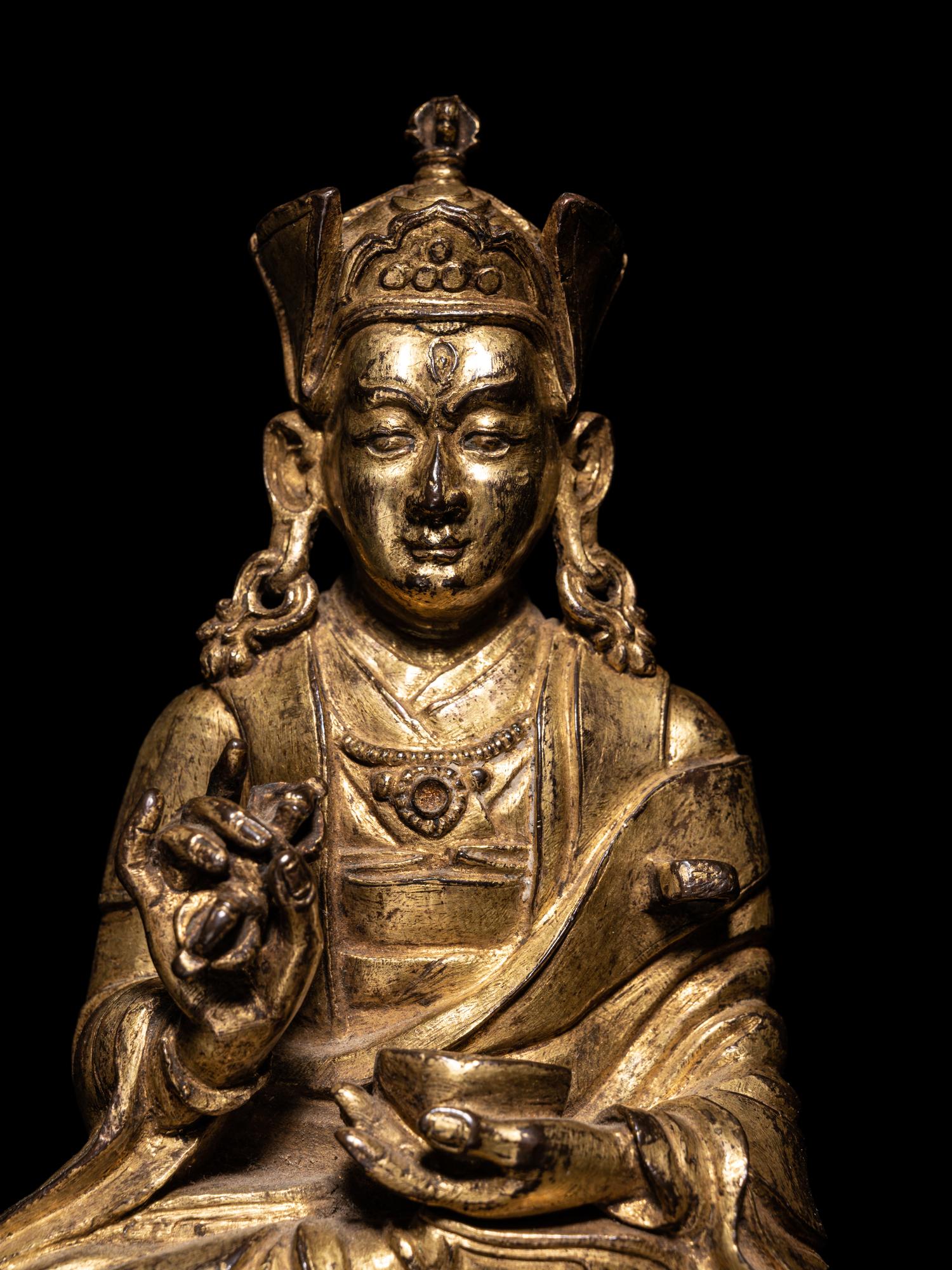A Tibetan Gilt Bronze Figure of a Seated Karmapa