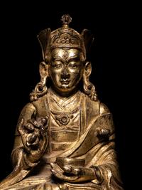 A Tibetan Gilt Bronze Figure of a Seated Karmapa