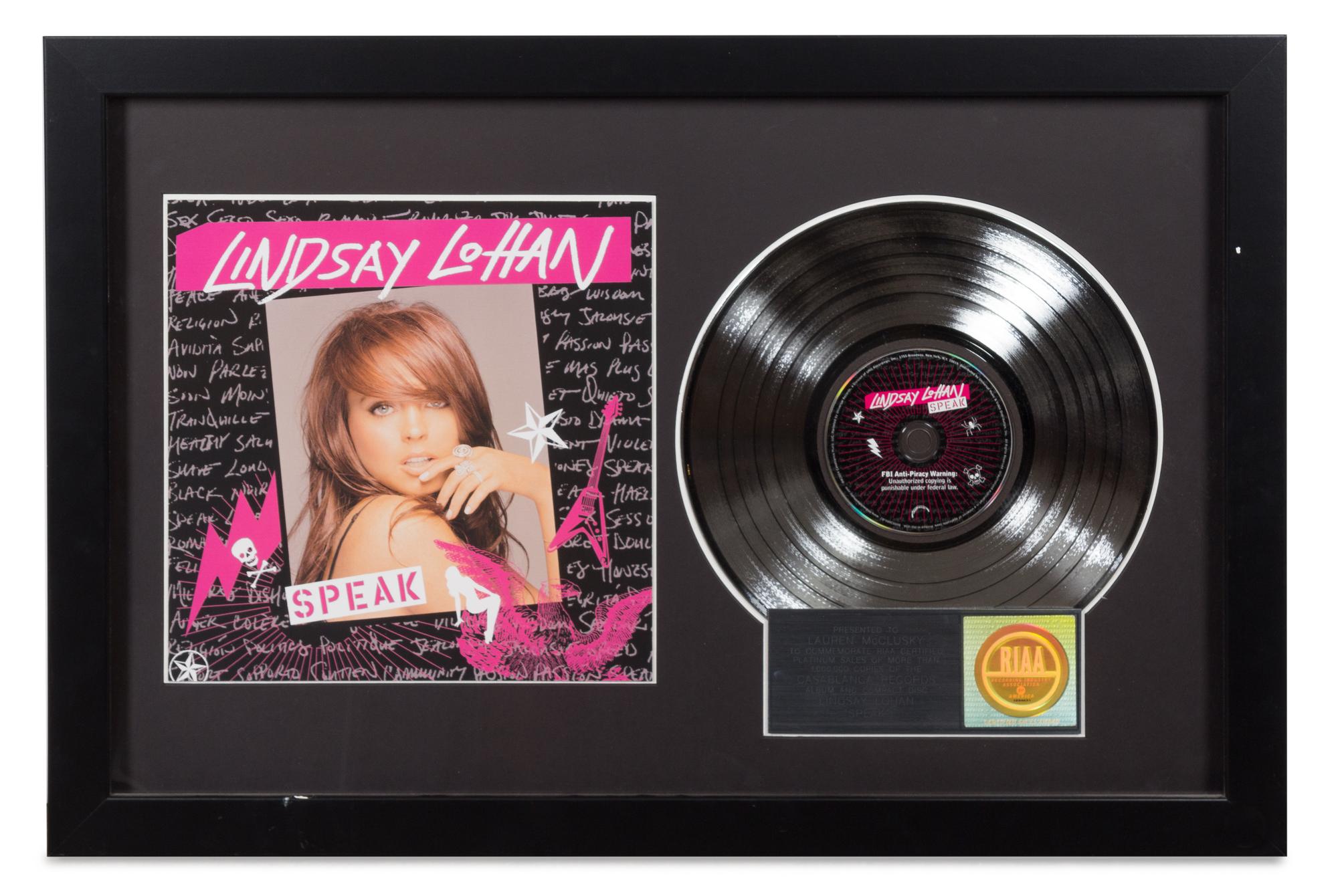 A Lindsey Lohan: Speak RIAA Certified Platinum Presentation Album 20 1/4 x 30 1/4 inches.