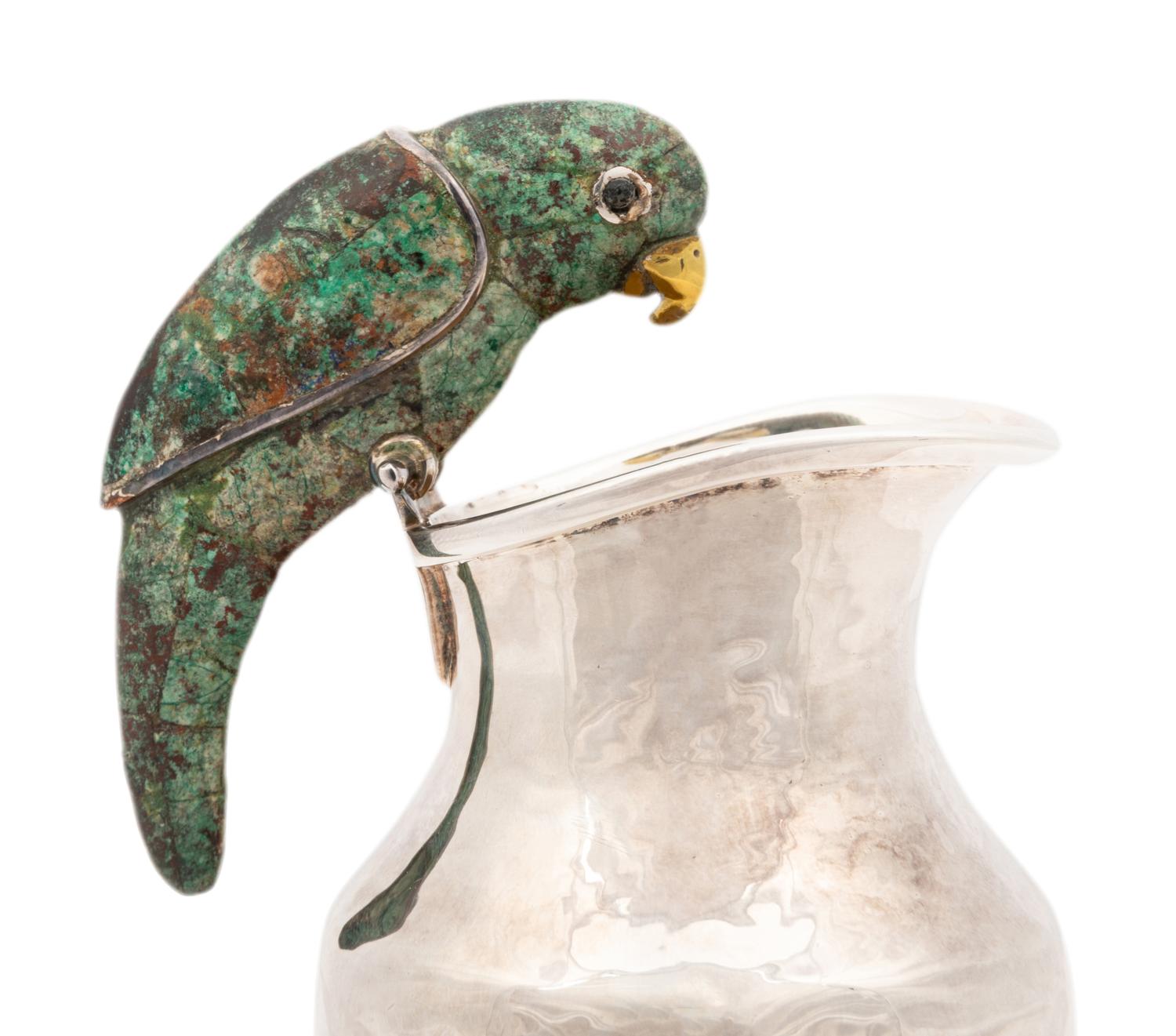 A Pair of Los Castillo Silver Pitchers