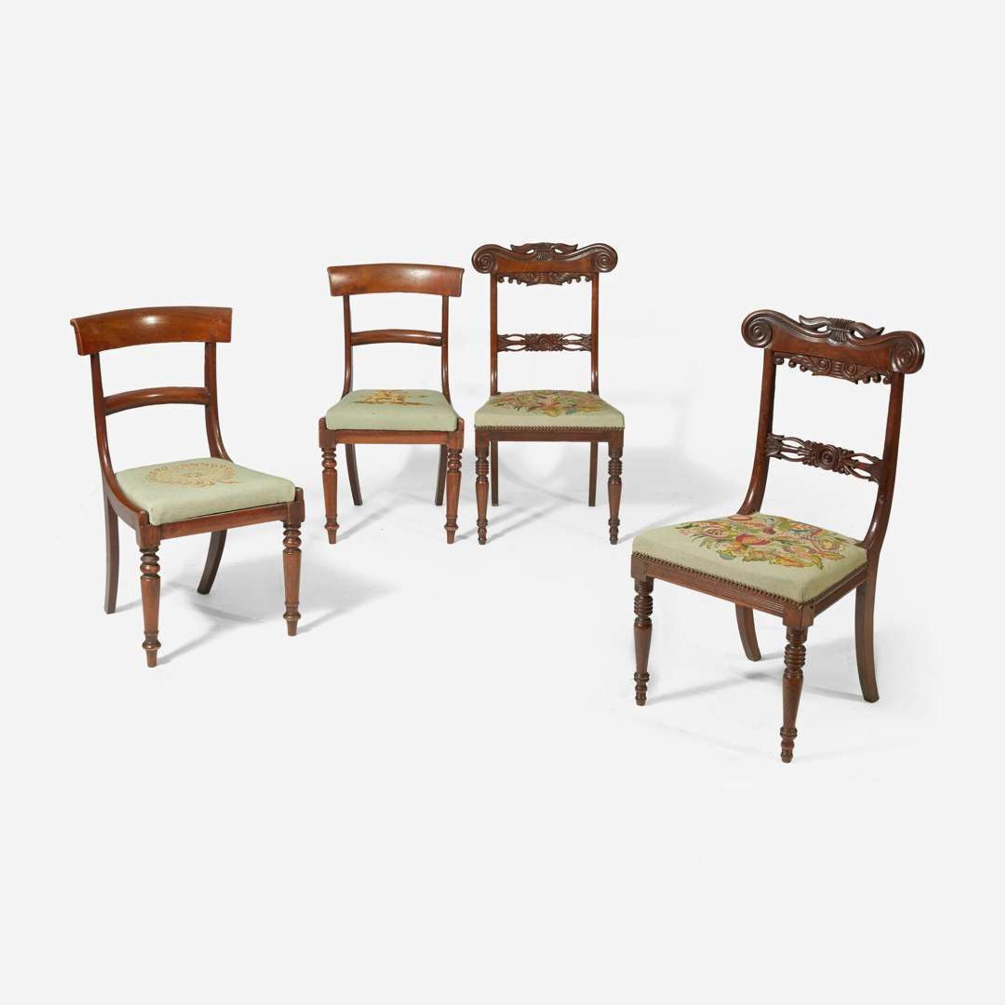 A group of four Regency carved mahogany side chairs circa 1810-1820