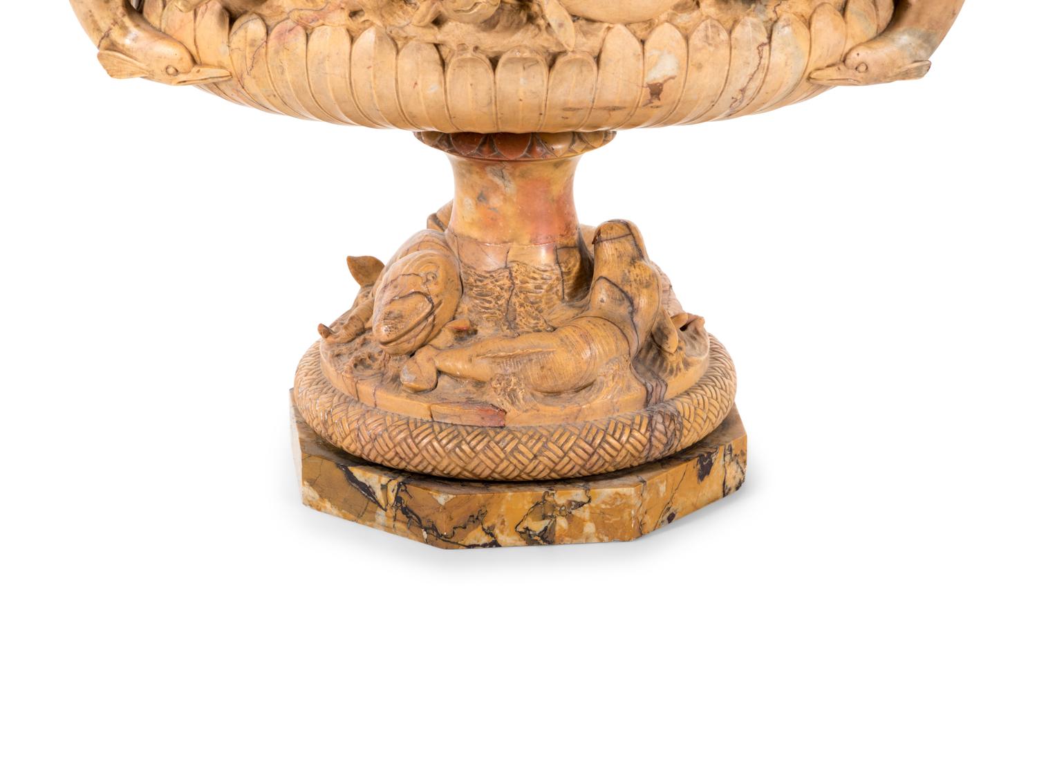 A Continental Carved Marble Urn