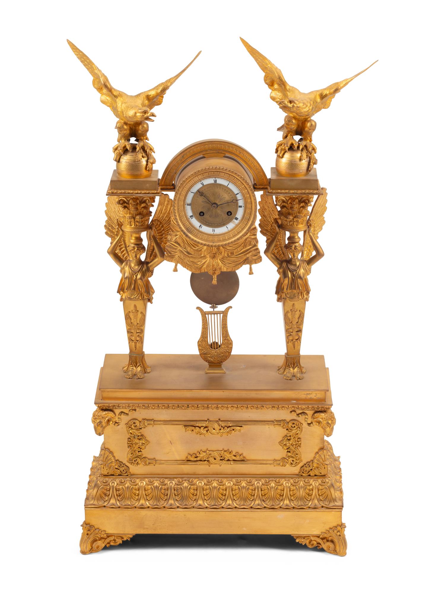A Large Restauration Gilt Bronze Mantel Clock