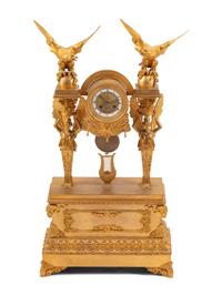 A Large Restauration Gilt Bronze Mantel Clock