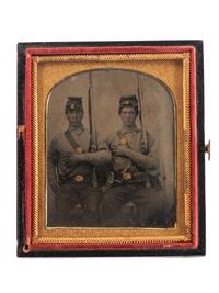 [CIVIL WAR]. Sixth plate tintype of two soldiers armed with muskets and a Bowie knife.