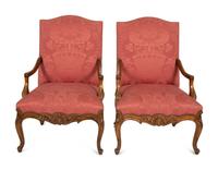 A Pair of Regence Style Carved Beechwood Fauteuils