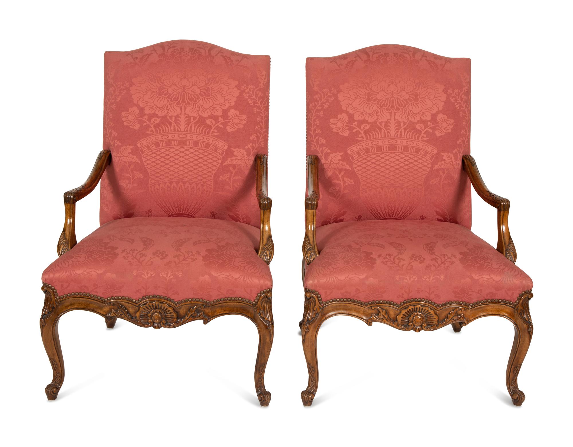 A Pair of Regence Style Carved Beechwood Fauteuils