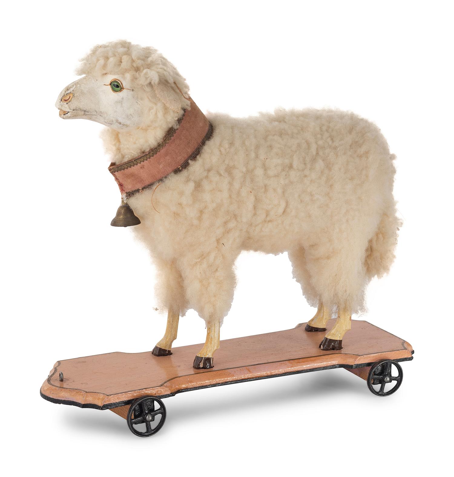 A Small Leather, Wool and Glass Inset Vocal Sheep Pull Toy