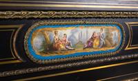 A French Ebonized, Gilt Bronze and Porcelain Mounted Console Cabinet