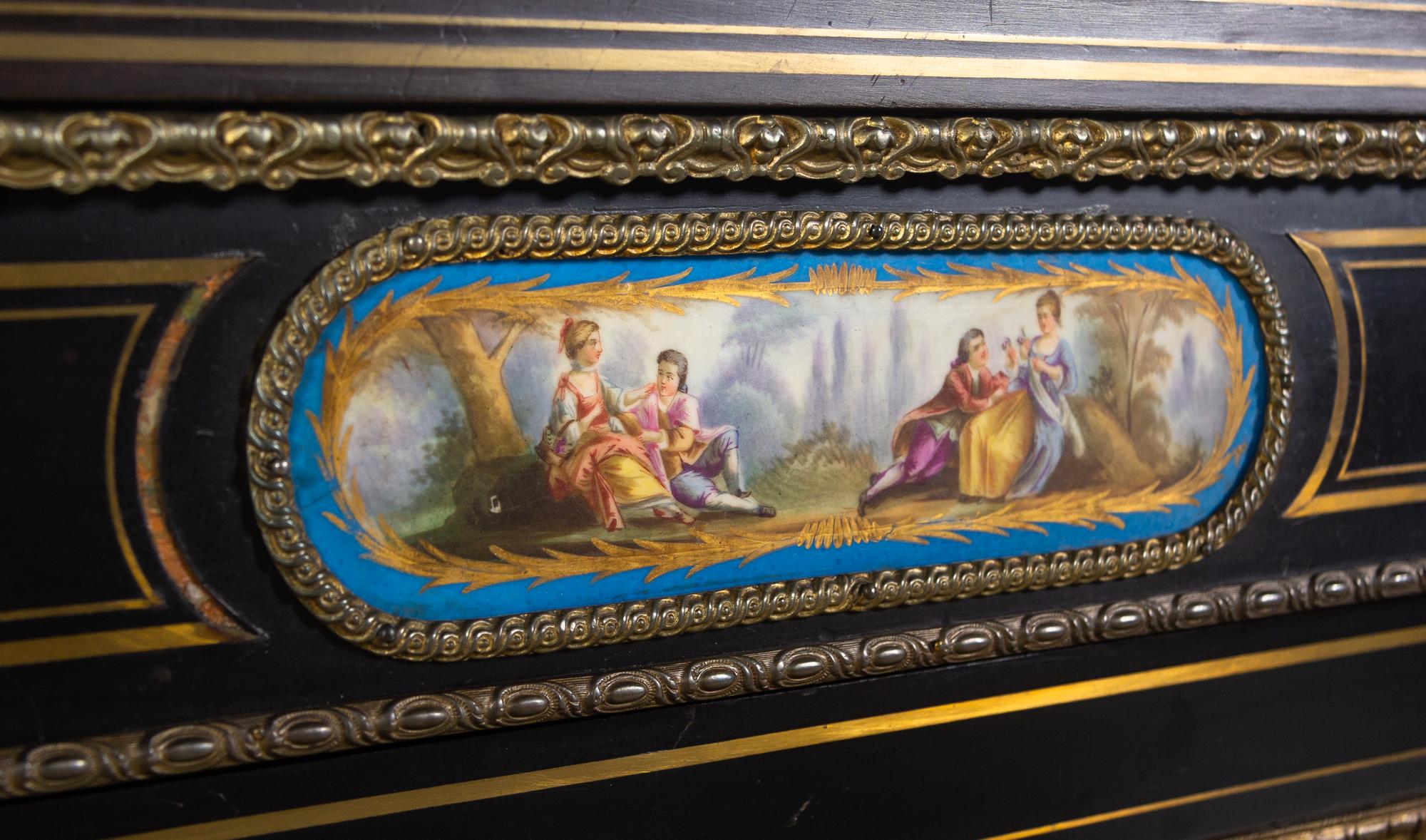 A French Ebonized, Gilt Bronze and Porcelain Mounted Console Cabinet