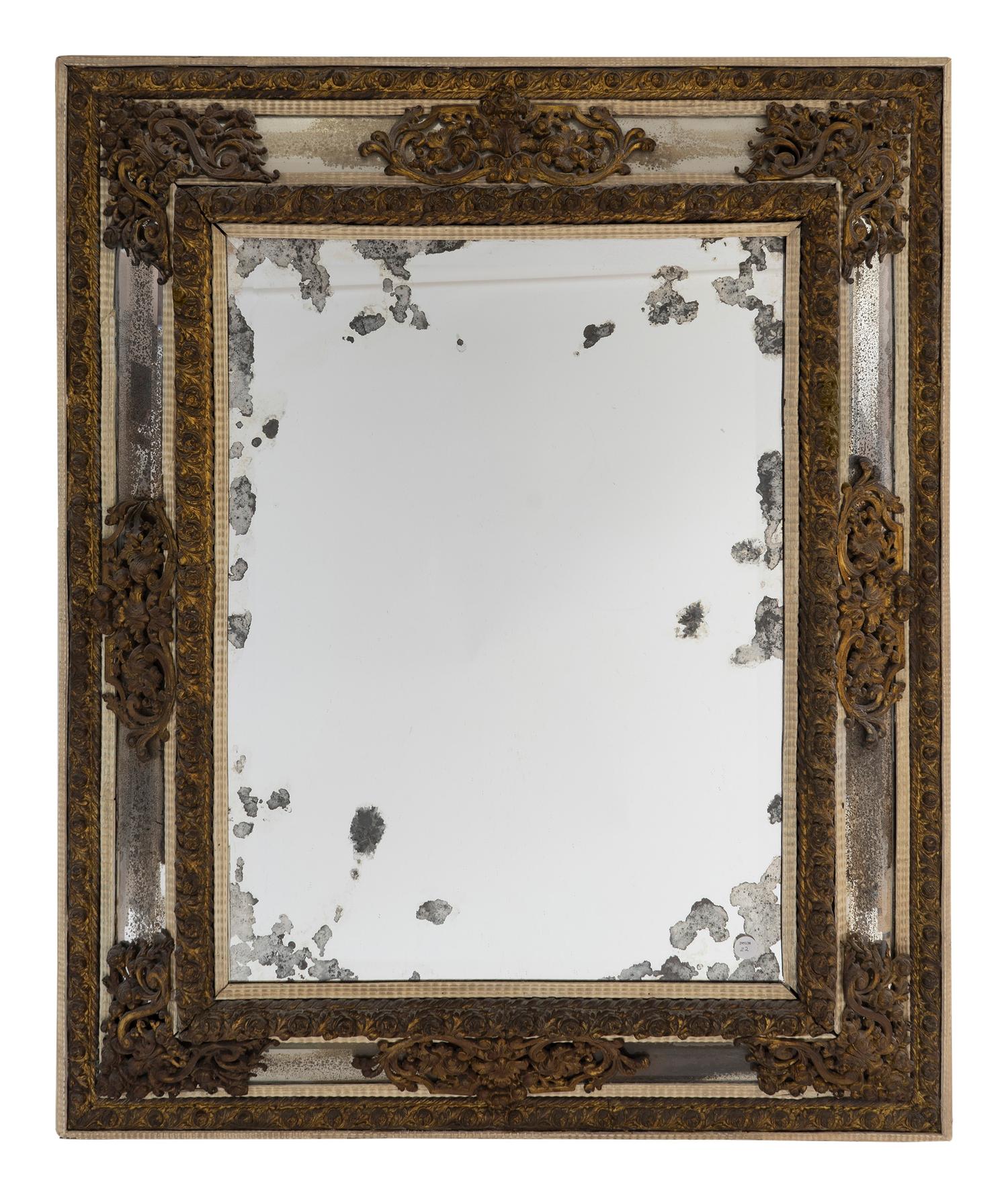 A Venetian Style Repousse Brass Mounted Cushion Frame Mirror — 20TH CENTURY